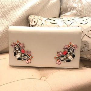 Embellished white clutch